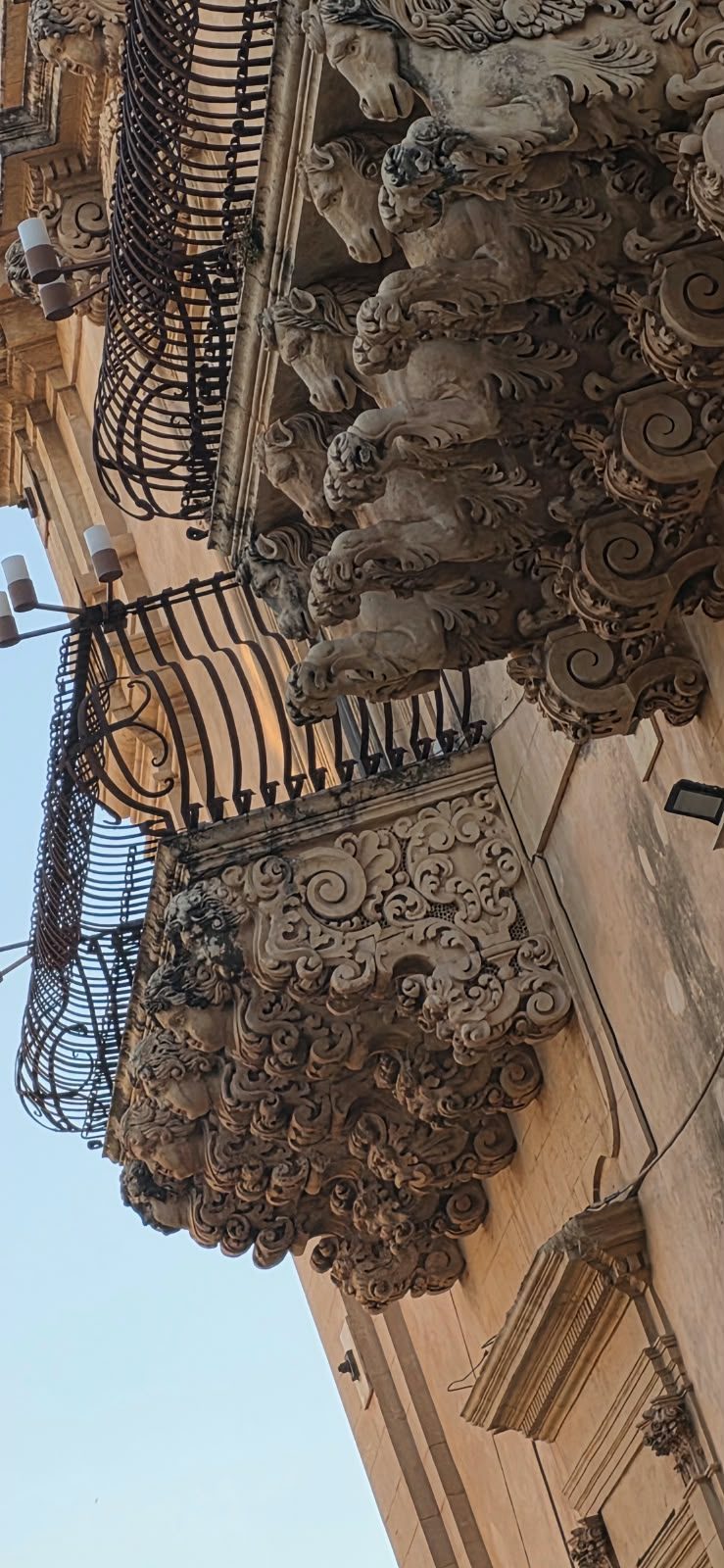 Noto: Baroque balconies in the old town.